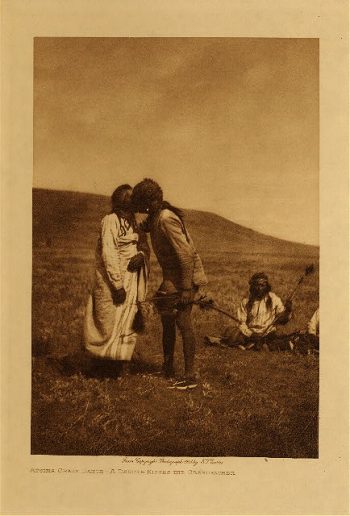 Atsina crazy dance : A dancer kisses the grandfather 1908
