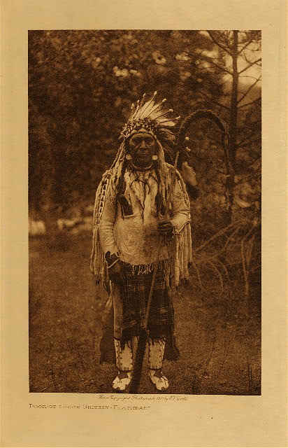 Door-of-lodge grizzly (Flathead) 1910