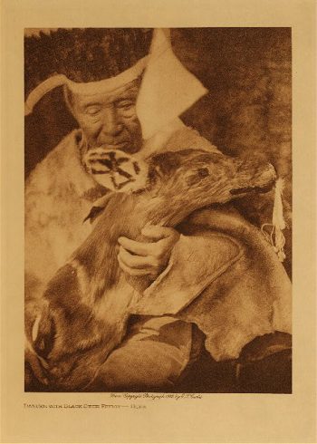 Dancer with black deer effigy (Hupa) 1923