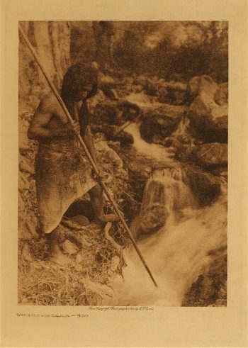 Watching for salmon (Hupa) 1923