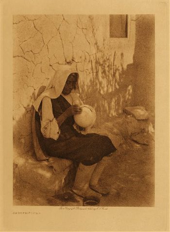 An Isleta potter 1925