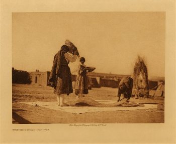 Winnowing wheat (San Juan) 1905