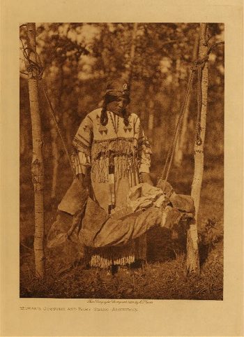 Woman's costume and baby swing (Assiniboin) 1926