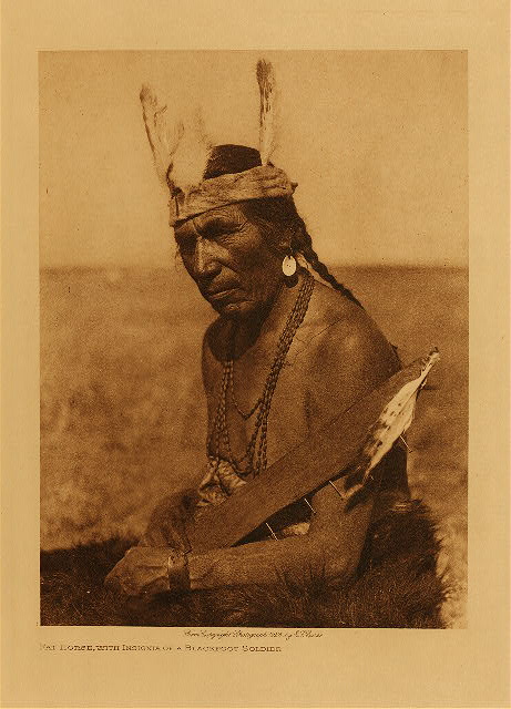 Fat horse, with insignia of a Blackfoot soldier 1926