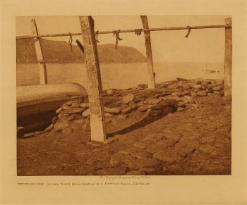 Underground house tops with whale-rib drying rack, Diomede 1928