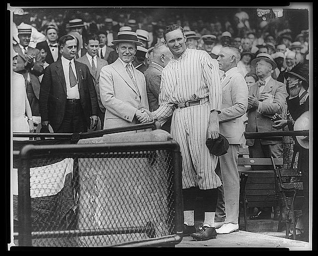 President Coolidge shaking hands with Walter Johnson