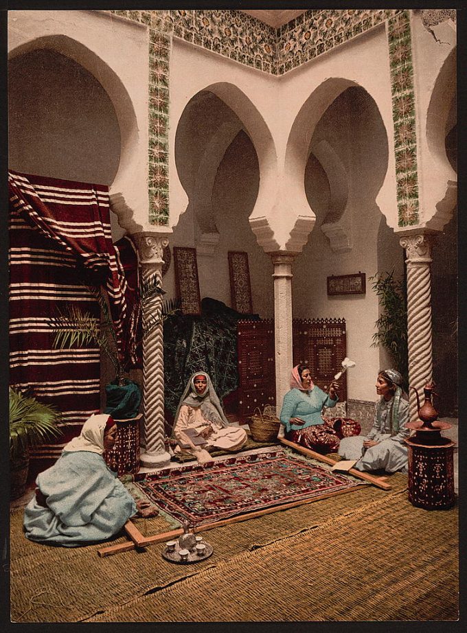 Moorish women making Arab carpets, Algiers, Algeria