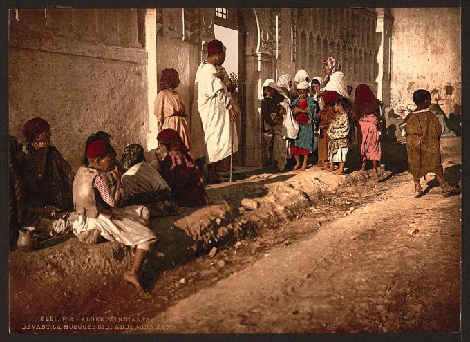 Beggars in front of mosque "Sidi Abderrhaman", Algiers, Algeria