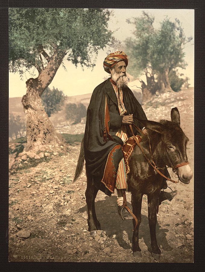 Native of Bethlehem on his donkey, Holy Land, (i.e., West Bank)