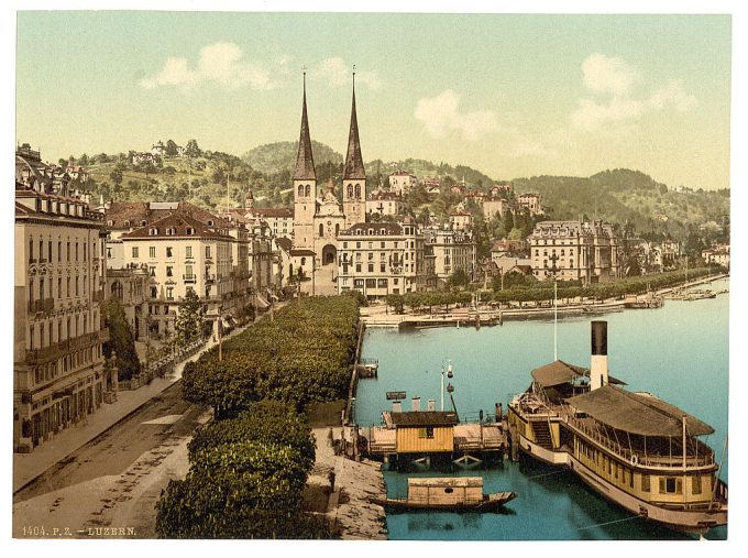 The quay, Hotels Schweizerhof and National and Cathedral from the Swan Hotel, Lucerne, Switzerland