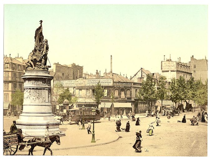 Street scene and monument, in the Place Clichy, Paris, France