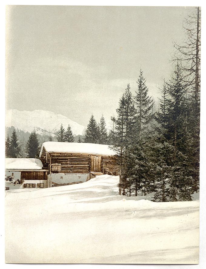 Winter scene with log structure