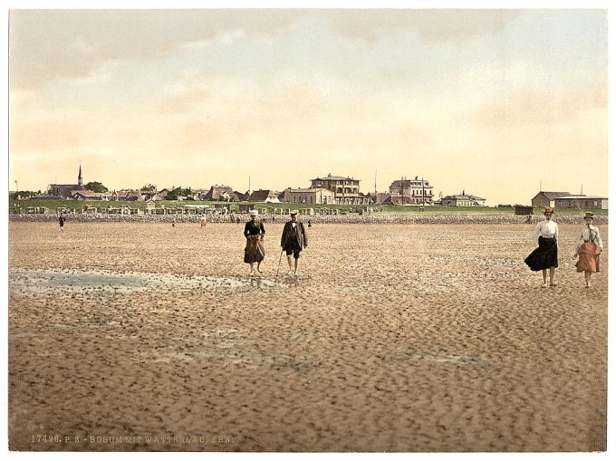 Wading on the beach, Busum, Schleswig-Holstein, Germany