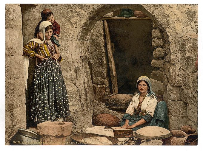 Syrian peasant making bread, Holy Land