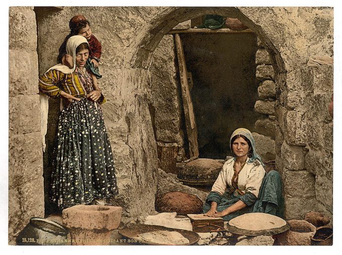 Syrian peasant making bread, Holy Land
